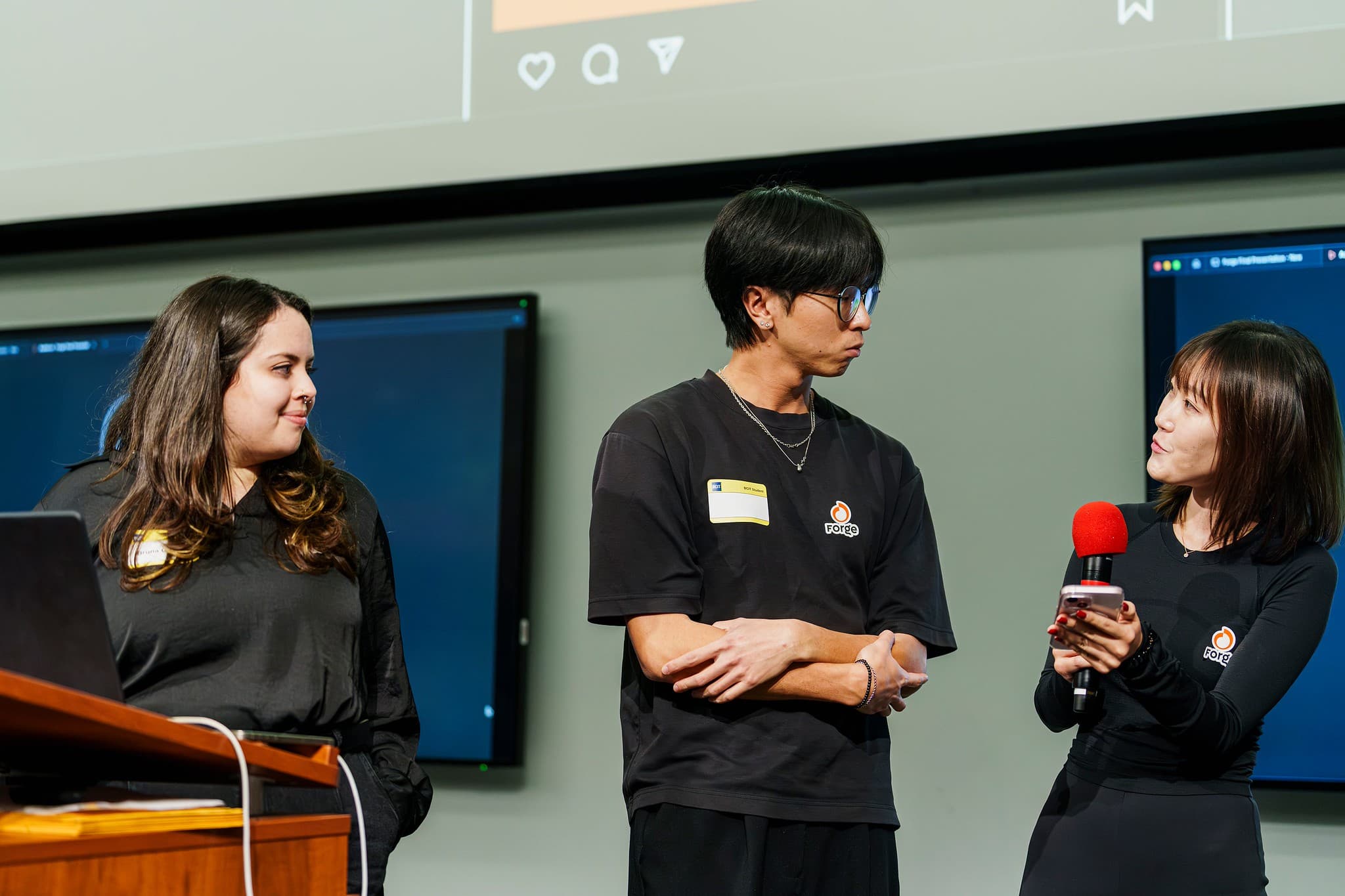 Forge team presenting at an event